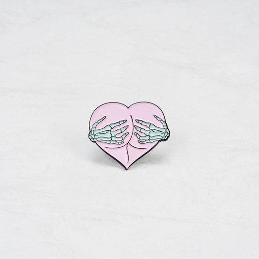 The Pink Heart Butt Hug Skeleton Hands Pin