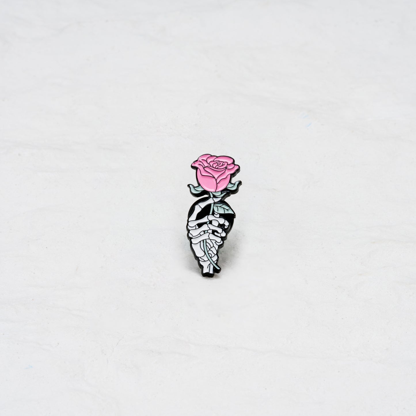 The Skull Hand Holding Pink Rose Pin