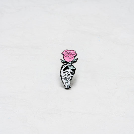 The Skull Hand Holding Pink Rose Pin