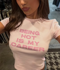 Pink Being Hot Is My Career Baby Tee