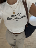 Too Old For Dicaprio Graphic Baby Tee
